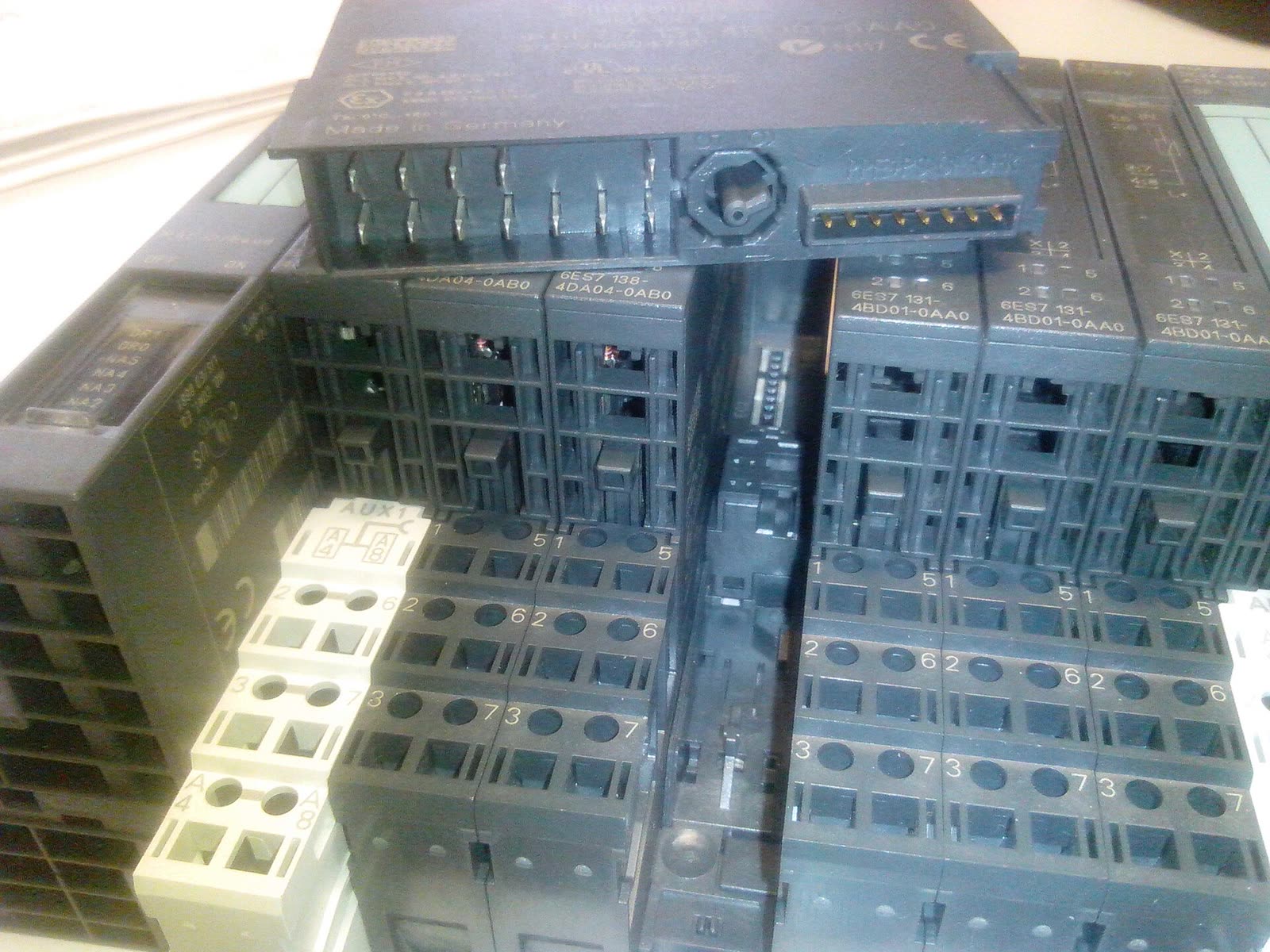 A row of distributed I/O modules in a control cabinet